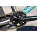 Close-up of Sunday Forecaster BMX bike sprocket and chain on chromoly frame with turquoise branding