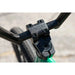 Close-up of the Sunday Forecaster BMX bike's black handlebar stem with "SUNDAY" engraving on a green frame