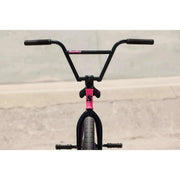 Front view of Sunday Street Sweeper BMX bike with black handlebars and pink head tube in matte finish