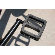 Close-up of black plastic pedal on Sunday Street Sweeper BMX bike crank arm