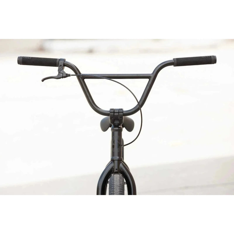 Close-up of black Sunday Model C BMX bike handlebars and front fork with brake lever and cable attached