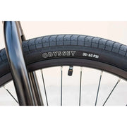 Close-up of Odyssey tire and black rim on the SUNDAY MODEL C 24" BMX bike wheel