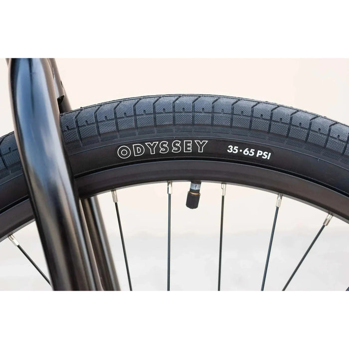 Close-up of Odyssey tire and black rim on the SUNDAY MODEL C 24" BMX bike wheel