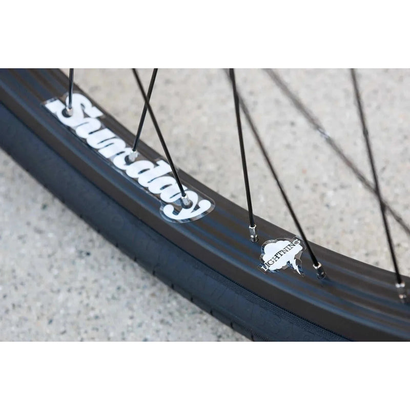 Close-up of Sunday Lightning rim and Odyssey Pursuit tire on SUNDAY MODEL C 24" BMX bike wheel
