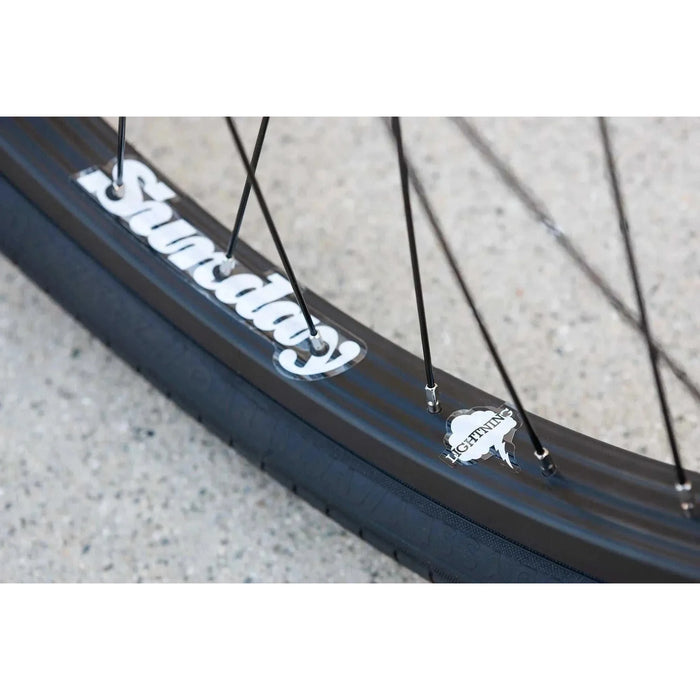 Close-up of Sunday Lightning rim and Odyssey Pursuit tire on SUNDAY MODEL C 24" BMX bike wheel