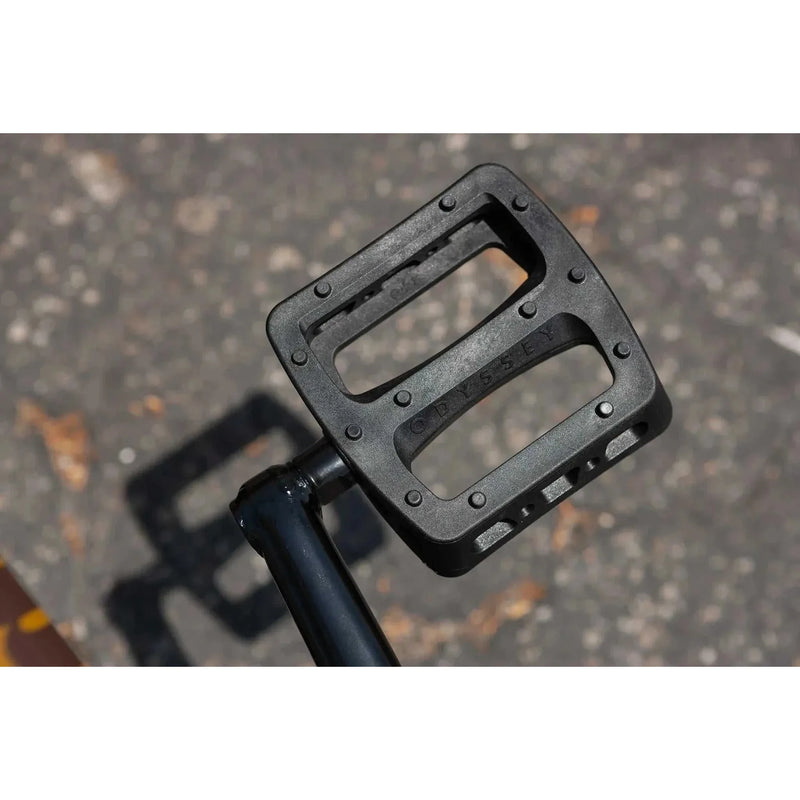 Close-up of black Odyssey plastic bike pedal on Sunday EX ARTEAGA 20" BMX complete bike pedal crank arm