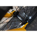 Close-up of Sunday EX Arteaga bike black hub with yellow fork and spokes
