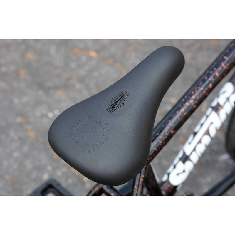Close-up of black seat on Sunday EX Elstran 20" complete BMX bike with gloss copper drop frame.