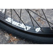 Close-up of Sunday EX Elstran BMX bike wheel with black Odyssey Path Pro tire and Sunday Lightning rim.