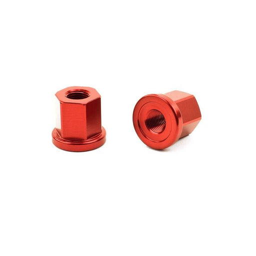 Pair of red Mission aluminum axle nuts, 17mm hex, lightweight and durable for smooth ride