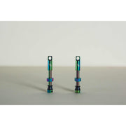 Set of two MTB tubeless presta valves with double air duct and metal caps, designed for easy installation and sealant blockage prevention.