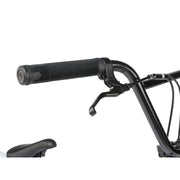 Close-up of black handlebar and brake lever on RADIO ASTRON FS COMPLETE BIKE