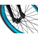 Close-up of front wheel and fork of RADIO ASTRON FS COMPLETE BIKE with blue rim and black spokes