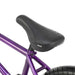 Close-up of the black padded seat on a purple RADIO DARKO bike frame designed for street riding