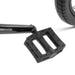 Close-up of black RADIO DARKO bike pedal and crank arm with tire in background on white background