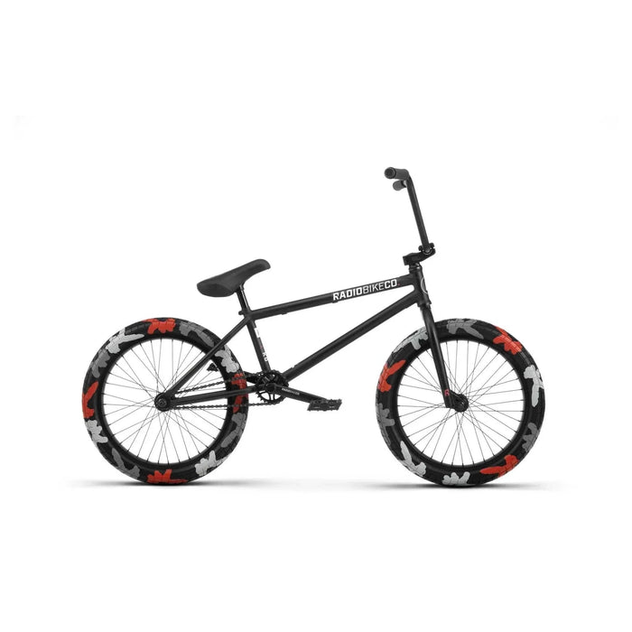 RADIO DARKO bike with removable brake mounts, flangeless grips, fat combo seat, and vibrant camo tires for street riding