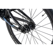 Close-up view of RADIO RACELINE XENON Expert bike rear wheel and drivetrain with black alloy frame and disc brake mount ready dropouts