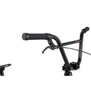 Close-up of Radio Raceline Xenon PRO bike handlebar with brake lever and grip in black finish
