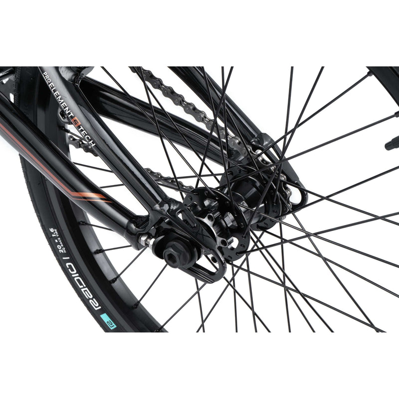 Close-up of the rear wheel and disc brake mount on a black Radio Raceline Xenon PRO BMX bike.