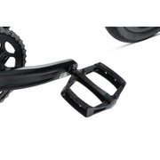 Close-up of Radio Raceline Xenon PRO bike black alloy crank and pedal against white background