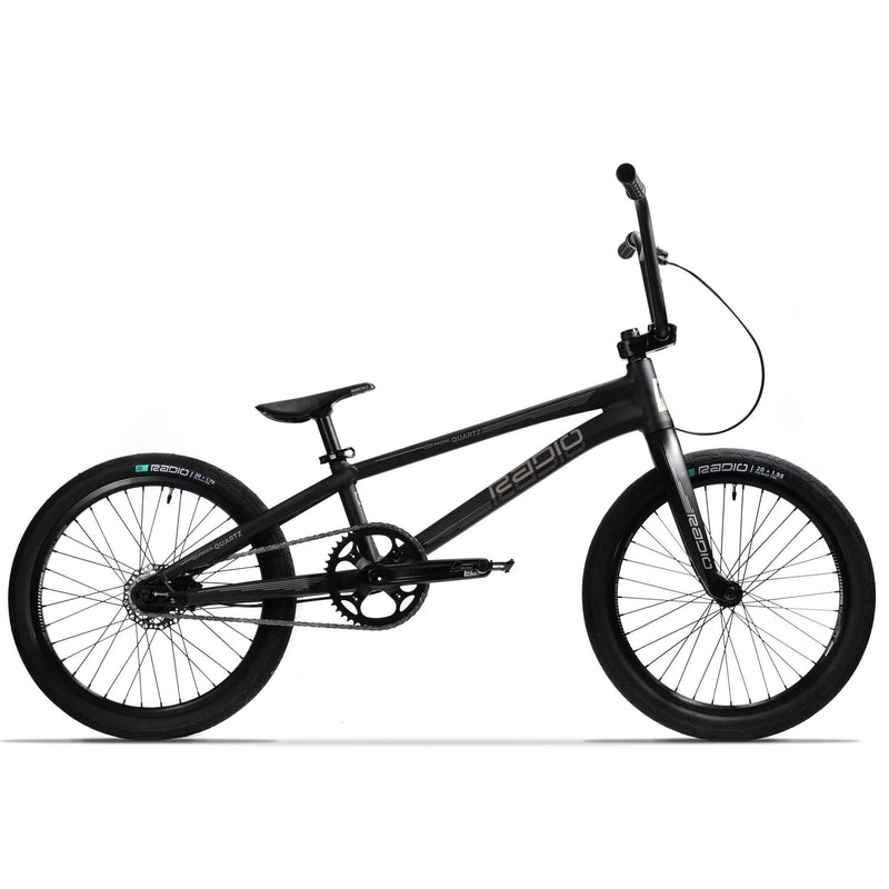 Black RADIO RACELINE QUARTZ PRO 20" complete BMX bike with lightweight alloy frame, Solar Carbon fork, hydraulic disc brakes, and Oxygen tires.