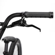 Close-up of RADIO RACELINE QUARTZ PRO bike black handlebar with hydraulic disc brake lever and textured grip