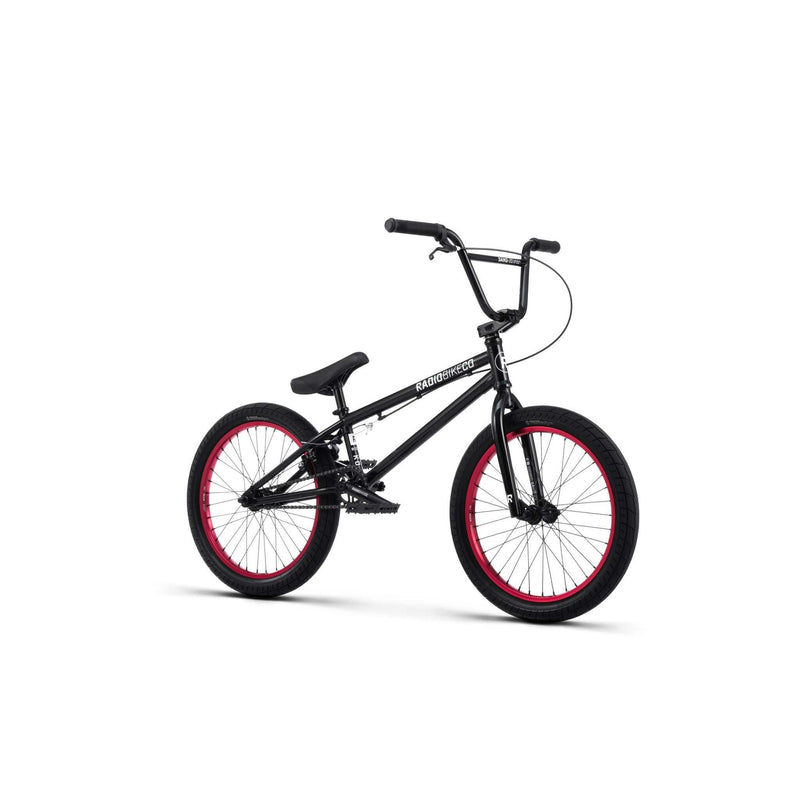 Black RADIO SAIKO 20 BMX bike with red rims and 20-inch wheels designed for nimble, responsive riding