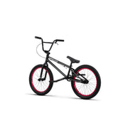 Black RADIO SAIKO 20 complete BMX bike with red rims and 20-inch wheels