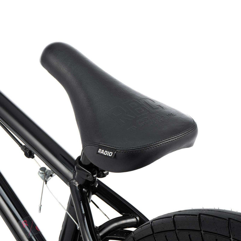 Close-up of the black saddle and rear frame of the Radio Saiko 20 complete bike.