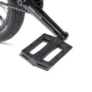Close-up of RADIO SAIKO 20 bike black plastic pedal and crank arm