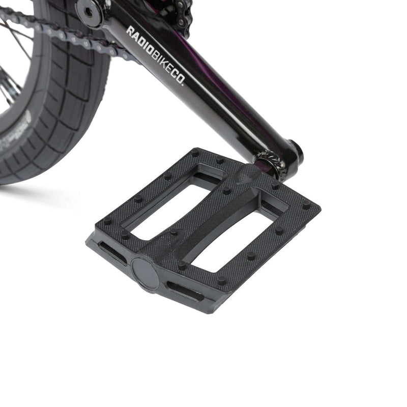Close-up of RADIO SAIKO 20 bike black plastic pedal and crank arm