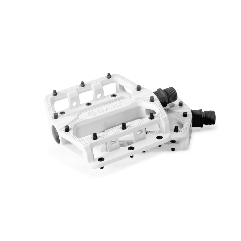 White alloy SALT SLIM PEDALS with replaceable pins and knurled body for grip.