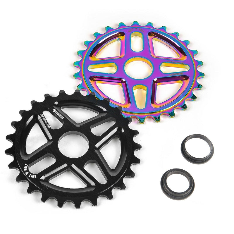 Saltplus Center Sprocket in black and oil slick colors with spindle adapters.