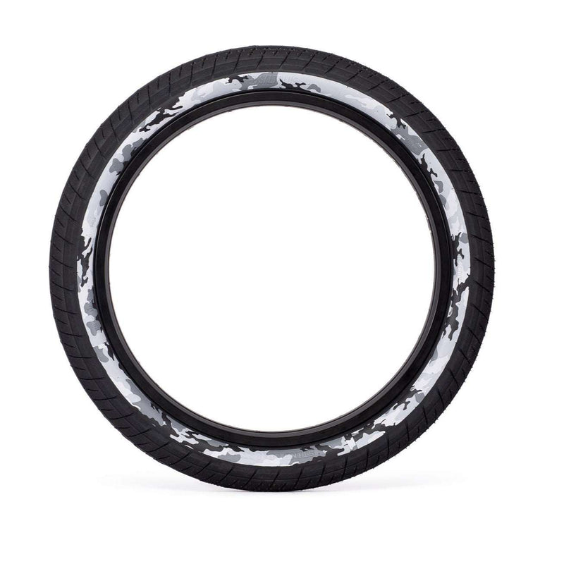 SALTPLUS STING TIRE 20-inch BMX tire with black and white camouflage sidewall, smooth center tread and aggressive knurling for versatile grip on all surfaces