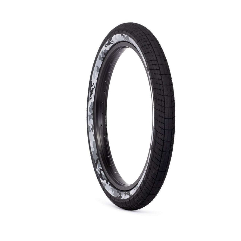 SALTPLUS STING TIRE 20-inch BMX tire with black and grey camouflage sidewall and aggressive tread pattern