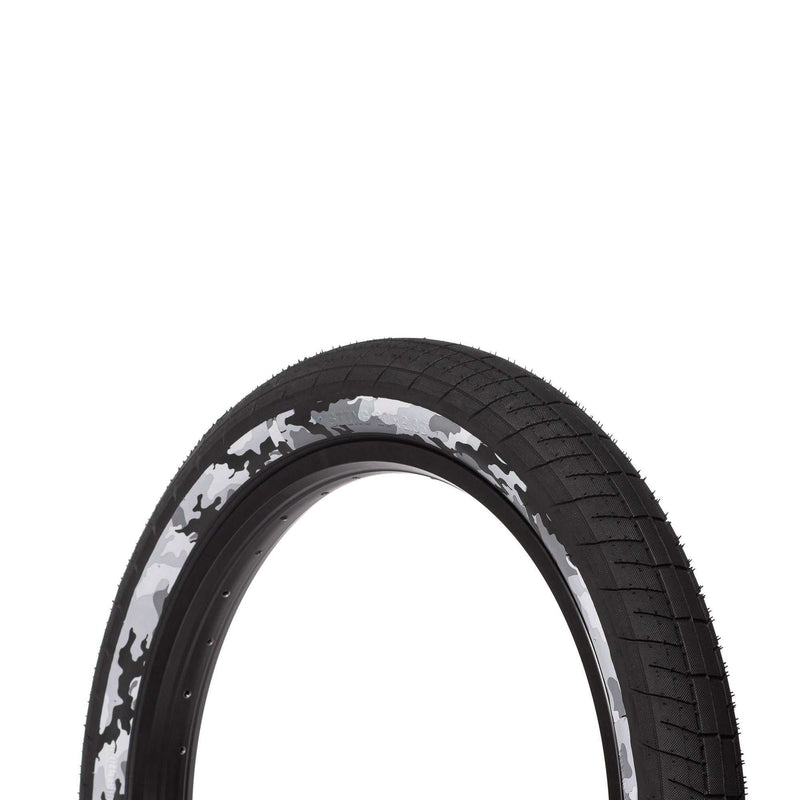 Saltplus Sting Tire 20-inch BMX tire with black and white camouflage sidewall and smooth center tread for versatile grip and durability