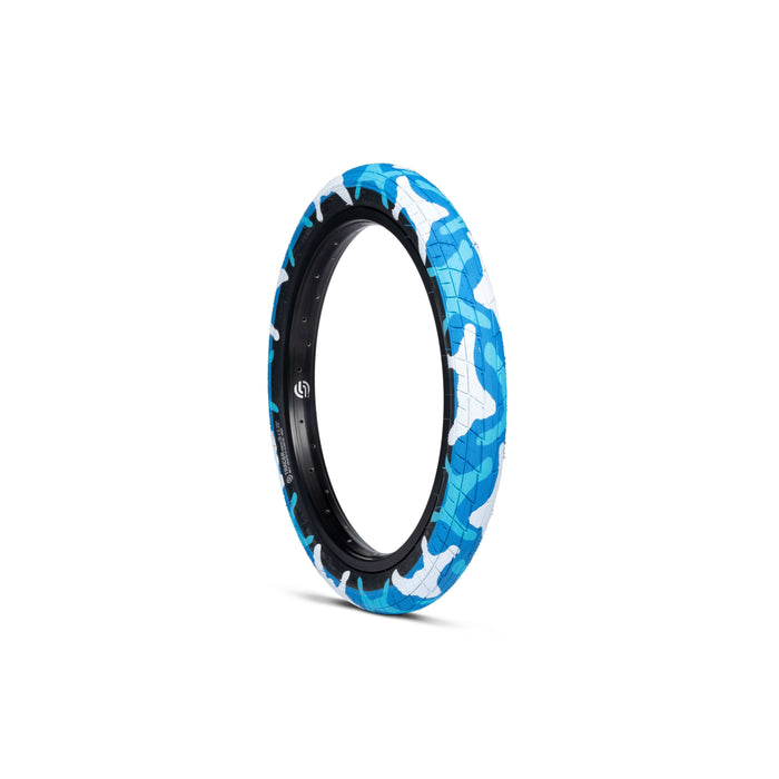 Salt Tracer Tire in blue camo with knurled surface and directional tread for BMX bikes.