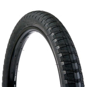 Black SALT CONTOUR TIRE with wrap around directional tread and micro-knurling for extra grip, available in 18"x2.35" and 20"x2.35" sizes.