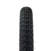Black Salt Contour Tire with knurled directional tread design for grip, size options 18"x 2.35" and 20"x 2.35".