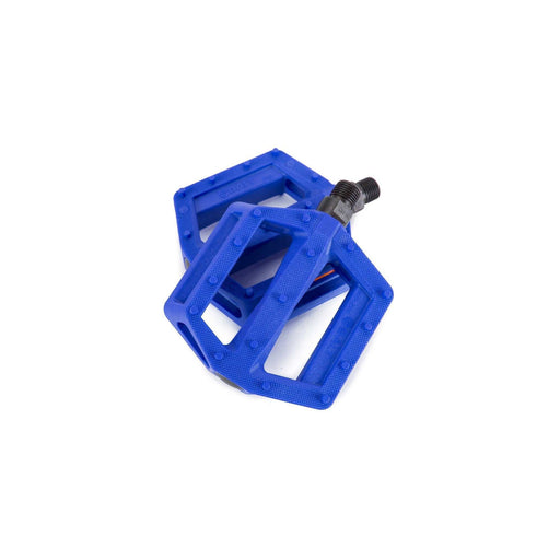 Blue SALT JUNIOR PEDALS for BMX bikes, strong nylon/fiberglass, crmo axle, lightweight design.
