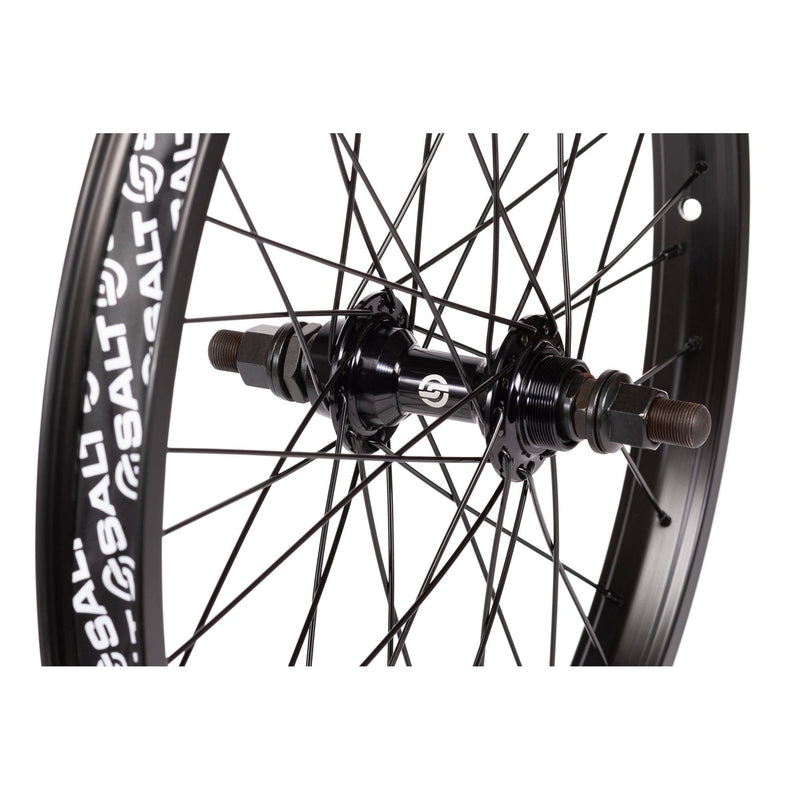 Black SALT ROOKIE FREEWHEEL rear wheel with alloy hub and 35mm BEAM rim.