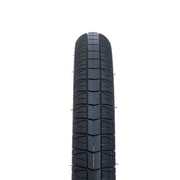 Salt Strike Tire with black directional tread design, 20"x 2.35", offers grip and strength, featuring a 22tpi casing and 65psi rating.