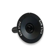 Black CNC-machined 6061 T6 alloy MTB headset top cap and bolt set with TITLE MTB branding