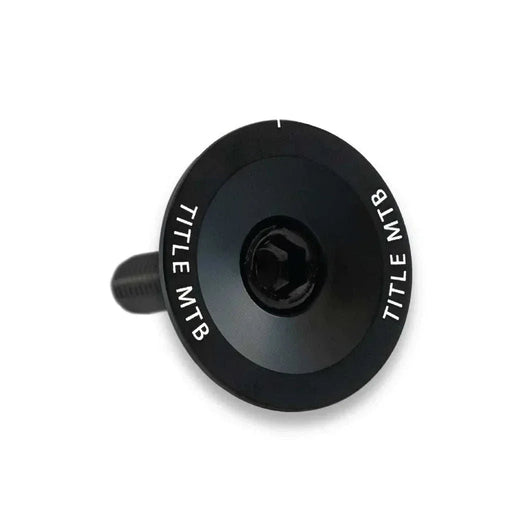 Black CNC-machined 6061 T6 alloy MTB headset top cap and bolt set with TITLE MTB branding