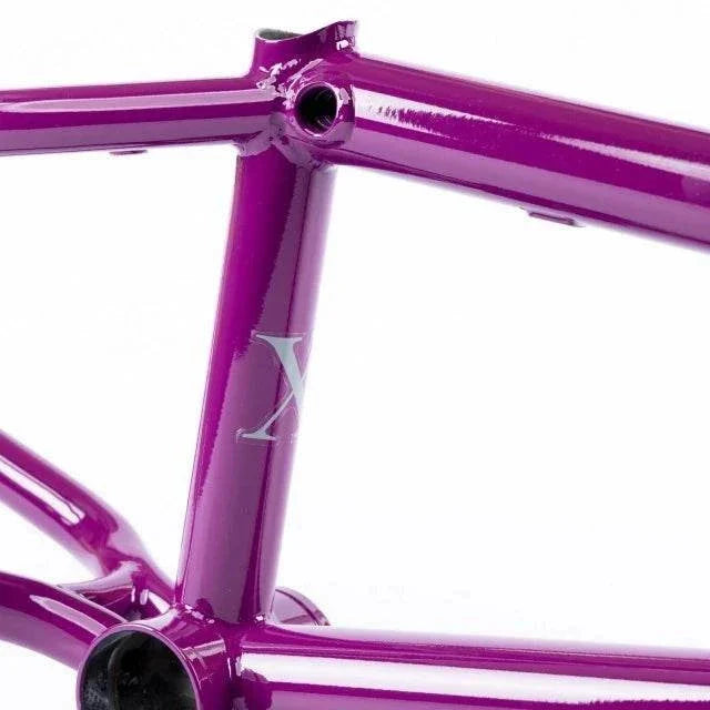 Purple Total BMX 657 frame with multi-butted chromoly tubing and ovalized chainstays for BMX bikes