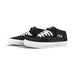 Black and white VANS SKATE HALF CAP shoes with suede and canvas upper, white laces, and durable rubber sole designed for skateboarding and BMX.