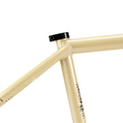 Wethepeople Pathfinder BMX frame in beige with CNC machined details and durable 4130 crmo tubing.