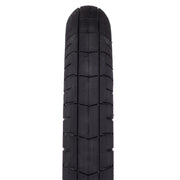 WETHEPEOPLE ACTIVATE TIRE, black tread design, knurled pattern, durable rubber, fast-rolling.