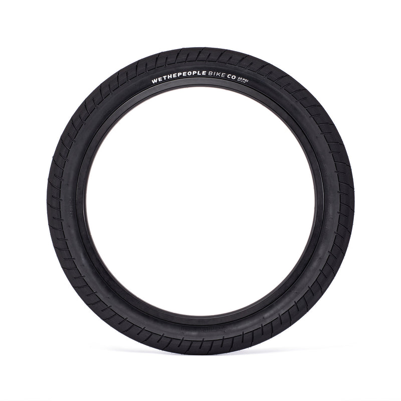 WETHEPEOPLE ACTIVATE TIRE with fast-rolling, grippy tread and unique sidewall design for grind resistance.