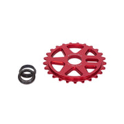 Red WETHEPEOPLE Logic sprocket with three black adapters for BMX crank compatibility